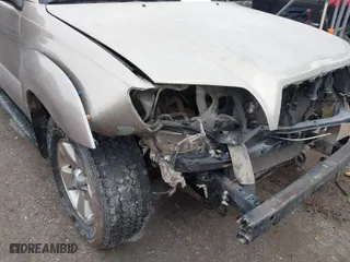 2006 Toyota 4Runner SR5 with VIN JTEZU14R668042933, listed as a IAAI auction lot 41407322 with 163,716 mi miles. Bid and sale history available at carsss.com. Image 6.