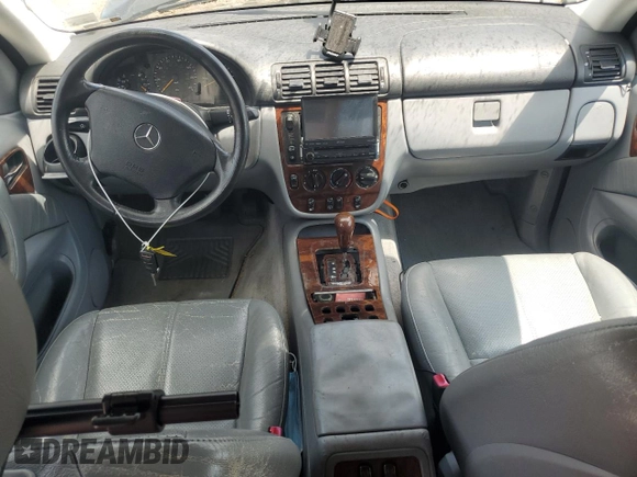 2000 Mercedes-Benz M 320/430/500 with VIN 4JGAB72E7YA168445, listed as a Copart auction lot 59401235 with 231,591 mi miles and Salvage title. Bid and sale history available at DreamBid. Image 8.