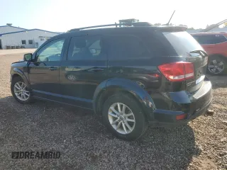 2017 Dodge Journey SXT with VIN 3C4PDDBG8HT525147, listed as a Copart auction lot 63270795 with 169,369 mi miles and Salvage title. Bid and sale history available at DreamBid. Image 2.
