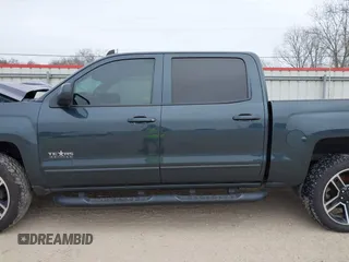 2018 Chevrolet Silverado 1500 LT with VIN 3GCPCREC1JG497019, listed as a IAAI auction lot 41459936 with 52,691 mi miles and . Bid and sale history available at DreamBid. Image 14.