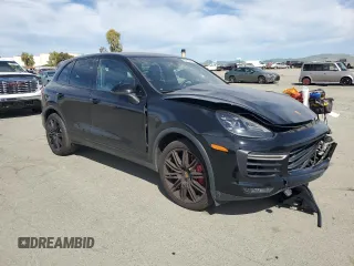 2017 Porsche Cayenne Turbo with VIN WP1AC2A2XHLA92055, listed as a Copart auction lot 52610555 with 82,224 mi miles and Salvage title. Bid and sale history available at DreamBid. Image 4.