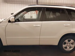 2006 Suzuki Grand Vitara Premium with VIN JS3TD943664100584, listed as a IAAI auction lot 41453129 with 159,220 mi miles and . Bid and sale history available at DreamBid. Image 14.