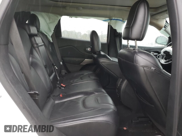 2019 Jeep Cherokee Limited z VIN 1C4PJMDXXKD409564, wystawiony jako Copart lot #60893225 z przebiegiem 128 674 mil mil oraz Szkoda całkowita • Salvage title. Historia ofert i sprzedaży dostępna na DreamBid. Obrazek 11.