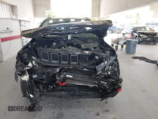 2020 Jeep Compass Trailhawk with VIN 3C4NJDDB3LT170463, listed as a IAAI auction lot 42446080 with 83,336 mi miles and . Bid and sale history available at DreamBid. Image 13.