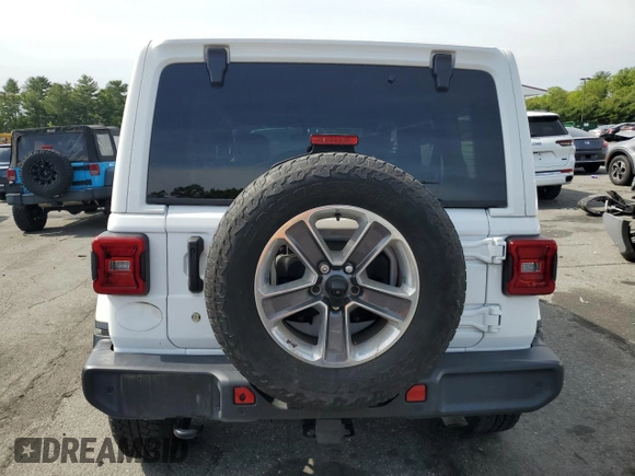 2020 Jeep Wrangler Unlimited Sahara with VIN 1C4HJXEG3LW243396, listed as a Copart auction lot 58709415 with 28,725 mi miles and Salvage title. Bid and sale history available at DreamBid. Image 6.