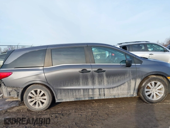 2018 Honda Odyssey LX with VIN 5FNRL6H27JB095795, listed as a IAAI auction lot 41780386 with 99,318 mi miles. Bid and sale history available at carsss.com. Image 13.