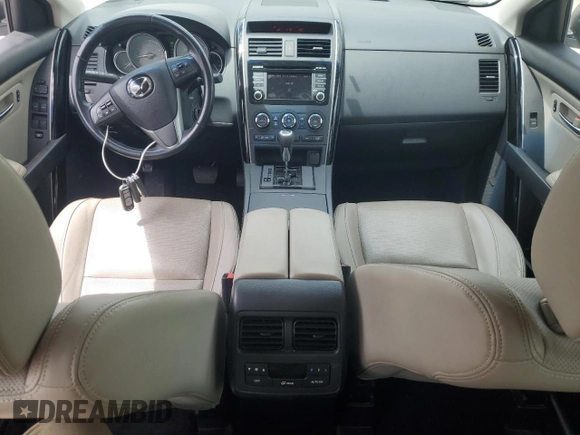 2014 Mazda CX-9 Touring z VIN JM3TB3CV7E0446466, wystawiony jako Copart lot #57631565 z przebiegiem 91 831 mil mil oraz Szkoda całkowita • Salvage title. Historia ofert i sprzedaży dostępna na DreamBid. Obrazek 8.