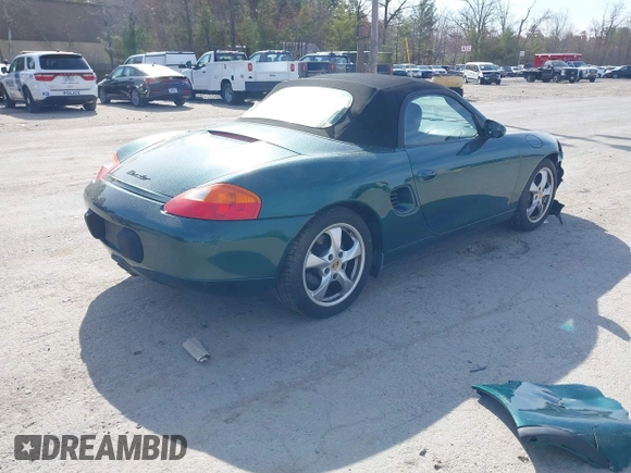 2001 Porsche Boxster z VIN WP0CA29831U623833, wystawiony jako IAAI lot #42075731 z przebiegiem 69 922 mil mil oraz . Historia ofert i sprzedaży dostępna na DreamBid. Obrazek 4.