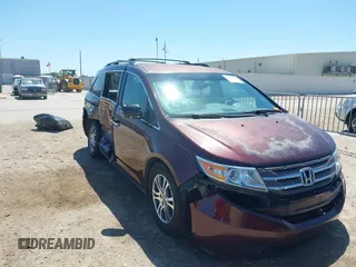 2011 Honda Odyssey EX with VIN 5FNRL5H42BB021438, listed as a IAAI auction lot 41978690 with 190,495 mi miles and . Bid and sale history available at carsss.com. Image 1.
