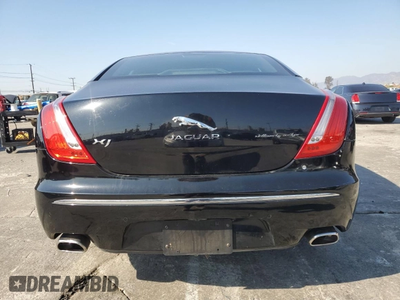 2011 Jaguar XJ with VIN SAJWA1CB4BLV05830, listed as a Copart auction lot 43007345 with 72,933 mi miles and Salvage title. Bid and sale history available at DreamBid. Image 6.