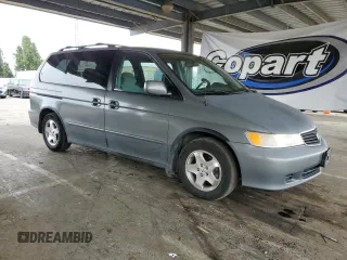 2000 Honda Odyssey EX с VIN 2HKRL1867YH555314, выставлен на аукционе Copart как лот 61065505 с пробегом 165 993 миль миль и Списание • Salvage title. История ставок и продаж доступна на DreamBid. Изображение 4.