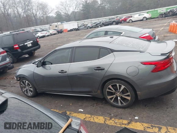 2018 Nissan Maxima S with VIN 1N4AA6AP7JC390262, listed as a IAAI auction lot 41490309 with 141,974 mi miles and . Bid and sale history available at DreamBid. Image 14.