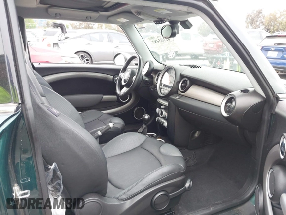 2009 MINI Hardtop S with VIN WMWMF735X9TT94065, listed as a IAAI auction lot 42183487 with 141,746 mi miles and . Bid and sale history available at DreamBid. Image 5.