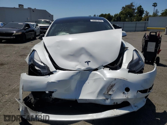 2023 Tesla Model 3 с VIN 5YJ3E1EA3PF575985, выставлен на аукционе Copart как лот 56001075 с пробегом 54 640 миль миль и Списание • Salvage title. История ставок и продаж доступна на DreamBid. Изображение 5.