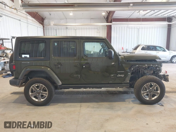2021 Jeep Wrangler Unlimited Sahara z VIN 1C4HJXEN2MW592565, wystawiony jako IAAI lot #41956072 z przebiegiem 95 504 mil mil oraz . Historia ofert i sprzedaży dostępna na DreamBid. Obrazek 14.