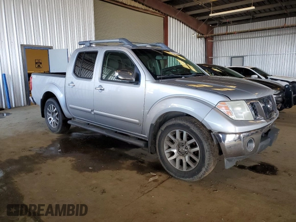 2009 Nissan Frontier SE with VIN 1N6AD07U69C403815, listed as a Copart auction lot 49161015 with 181,843 mi miles and Salvage title. Bid and sale history available at DreamBid. Image 4.