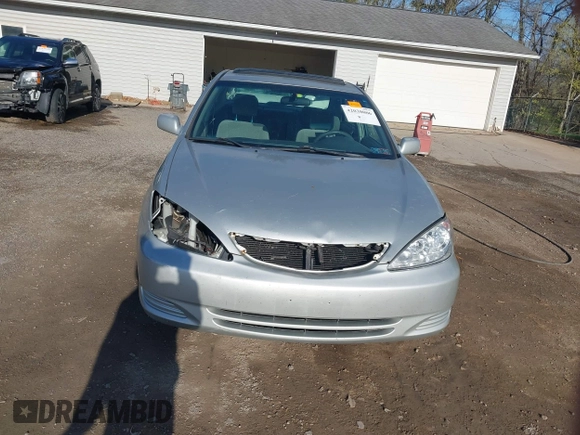 2004 Toyota Camry LE with VIN 4T1BE32K64U282875, listed as a IAAI auction lot 42038006 with 238,605 mi miles. Bid and sale history available at carsss.com. Image 13.