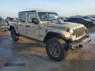 2022 Jeep Gladiator Rubicon z VIN 1C6JJTBG3NL174980, wystawiony jako Copart lot #85774884 z przebiegiem Nie podano mil oraz Nie do naprawy • Non repairable. Historia ofert i sprzedaży dostępna na DreamBid. Obrazek 4.