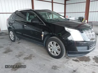 2011 Cadillac SRX Luxury Collection z VIN 3GYFNAEY9BS653352, wystawiony jako IAAI lot #42345078 z przebiegiem 118 030 mil mil oraz . Historia ofert i sprzedaży dostępna na DreamBid. Obrazek 1.