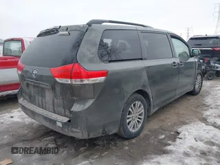 2012 Toyota Sienna XLE AAS with VIN 5TDYK3DCXCS206978, listed as a IAAI auction lot 41374061 with 307,827 mi miles and . Bid and sale history available at DreamBid. Image 4.