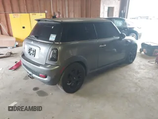 2009 MINI Hardtop S with VIN WMWMF73539TT98930, listed as a IAAI auction lot 42439606 with 152,954 mi miles and . Bid and sale history available at DreamBid. Image 4.