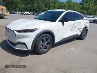 2021 Ford Mustang Mach-E Select z VIN 3FMTK1RM5MMA09245, wystawiony jako IAAI lot #42285393 z przebiegiem 97 554 mil mil oraz . Historia ofert i sprzedaży dostępna na DreamBid. Obrazek 2.