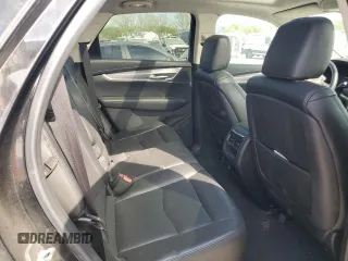 2017 Cadillac XT5 Premium Luxury AWD z VIN 1GYKNERS3HZ185853, wystawiony jako Copart lot #53446175 z przebiegiem 89 669 mil mil oraz Szkody całkowita. Historia ofert i sprzedaży dostępna na DreamBid. Obrazek 10.