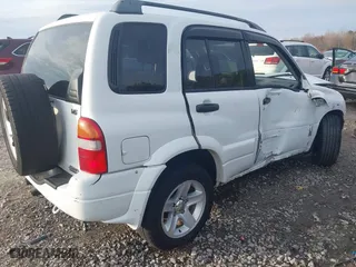 2001 Suzuki Grand Vitara with VIN JS3TE62V214154487, listed as a IAAI auction lot 41116104 with 1 mi miles. Bid and sale history available at carsss.com. Image 4.