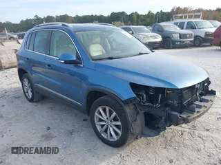 2017 Volkswagen Tiguan Wolfsburg Edition with VIN WVGRV7AX6HW504313, listed as a IAAI auction lot 40950812 with 149,884 mi miles and . Bid and sale history available at DreamBid. Image 1.