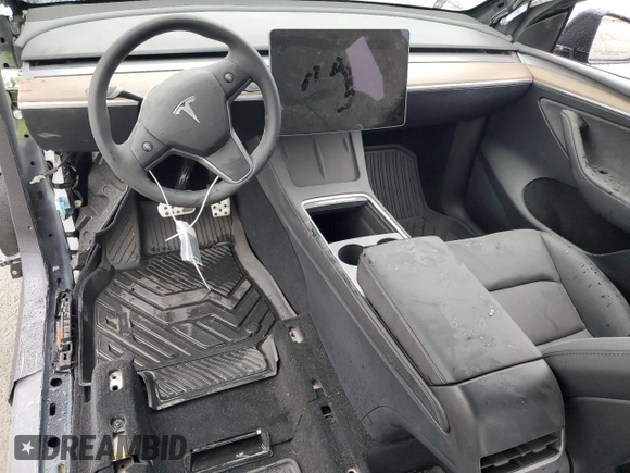 2024 Tesla Model Y with VIN 7SAYGDED6RF131193, listed as a Copart auction lot 47822735 with 10,007 mi miles and Salvage Title. Bid and sale history available at DreamBid. Image 8.