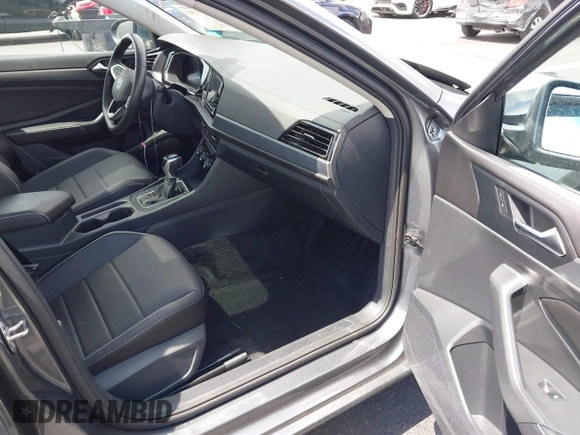 2024 Volkswagen Jetta SE with VIN 3VW7M7BU9RM005832, listed as a IAAI auction lot 42475250 with 10,036 mi miles and . Bid and sale history available at DreamBid. Image 5.