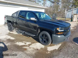 2018 Chevrolet Silverado 1500 Work Truck with VIN 1GCVKNEC1JZ228697, listed as a IAAI auction lot 41666501 with 84,827 mi miles. Bid and sale history available at carsss.com. Image 1.