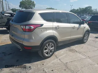 2017 Ford Escape SE z VIN 1FMCU0GD8HUC60074, wystawiony jako IAAI lot #41918443 z przebiegiem 85 787 mil mil oraz . Historia ofert i sprzedaży dostępna na DreamBid. Obrazek 4.