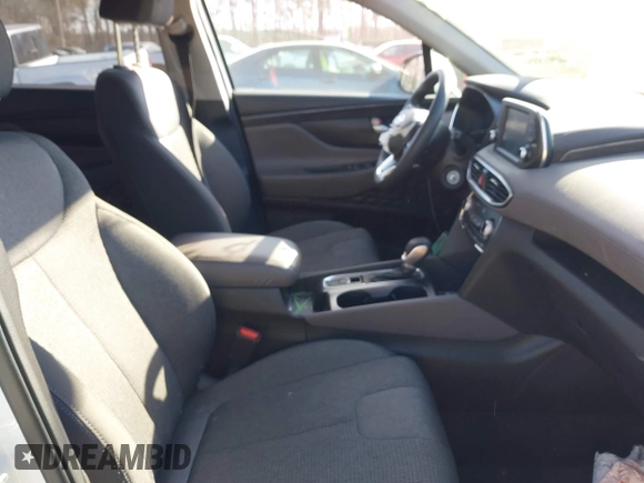 2019 Hyundai Santa Fe SE with VIN 5NMS2CAD5KH011357, listed as a IAAI auction lot 40918980 with 98,851 mi miles. Bid and sale history available at carsss.com. Image 5.