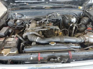 1991 Toyota Pickup DLX z VIN JT4RN93P7M5029610, wystawiony jako IAAI lot #42242230 z przebiegiem 166 530 mil mil oraz . Historia ofert i sprzedaży dostępna na DreamBid. Obrazek 10.