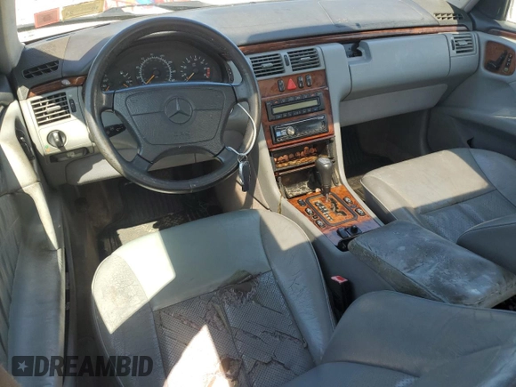 1999 Mercedes-Benz E-Class with VIN WDBJF65H0XA877630, listed as a Copart auction lot 69697454 with 0 mi miles and Salvage Title. Bid and sale history available at carsss.com. Image 8.