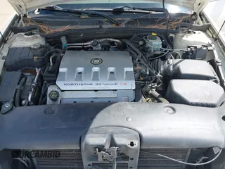 2002 Cadillac DeVille z VIN 1G6KD54Y42U141596, wystawiony jako IAAI lot #41989690 z przebiegiem 169 862 mil mil oraz . Historia ofert i sprzedaży dostępna na DreamBid. Obrazek 10.