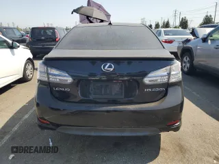 2010 Lexus HS 250h with VIN JTHBB1BA3A2006006, listed as a Copart auction lot 64557664 with 193,900 mi miles and Salvage Title. Bid and sale history available at DreamBid. Image 6.