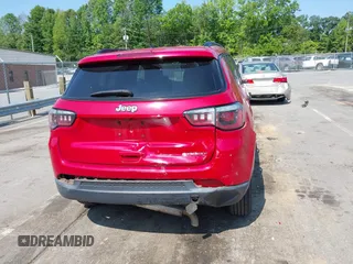 2018 Jeep Compass Sport with VIN 3C4NJCABXJT308768, listed as a IAAI auction lot 42420499 with 84,285 mi miles and . Bid and sale history available at DreamBid. Image 17.
