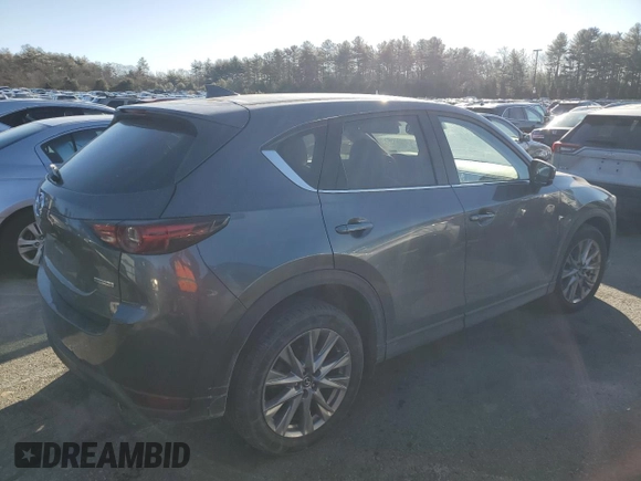 2021 Mazda CX-5 Grand Touring with VIN JM3KFBDM9M0490239, listed as a Copart auction lot 43306975 with 47,010 mi miles and Salvage Title. Bid and sale history available at carsss.com. Image 3.