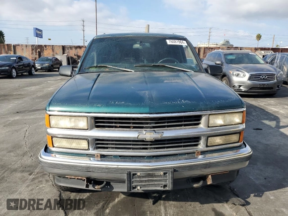 1997 Chevrolet Suburban with VIN 3GNFK16R4VG163602, listed as a Copart auction lot 76081984 with 243,169 mi miles and Salvage Title. Bid and sale history available at carsss.com. Image 5.