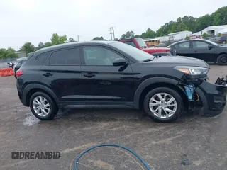 2019 Hyundai Tucson Value z VIN KM8J33A4XKU851129, wystawiony jako IAAI lot #42291275 z przebiegiem 127 705 mil mil oraz . Historia ofert i sprzedaży dostępna na DreamBid. Obrazek 13.