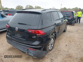 2018 Volkswagen Tiguan S with VIN 3VV0B7AX4JM098495, listed as a IAAI auction lot 41937757 with 179,168 mi miles and . Bid and sale history available at DreamBid. Image 4.