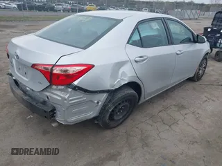 2019 Toyota Corolla L with VIN 2T1BURHE2KC153893, listed as a IAAI auction lot 41959128 with 78,741 mi miles. Bid and sale history available at carsss.com. Image 4.