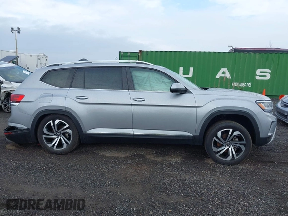 2023 Volkswagen Atlas SEL z VIN 1V2BR2CA9PC502866, wystawiony jako IAAI lot #41877062 z przebiegiem 18 605 mil mil oraz . Historia ofert i sprzedaży dostępna na DreamBid. Obrazek 13.