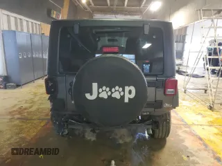 2017 Jeep Wrangler Willys Wheeler with VIN 1C4AJWAG3HL751703, listed as a Copart auction lot 88861635 with 14,114 mi miles and Salvage Title. Bid and sale history available at DreamBid. Image 6.