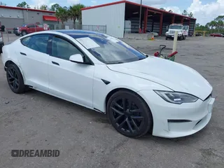 2021 Tesla Model S Plaid с VIN 5YJSA1E67MF436814, выставлен на аукционе IAAI как лот 42499058 с пробегом 21 401 миль миль и . История ставок и продаж доступна на DreamBid. Изображение 1.