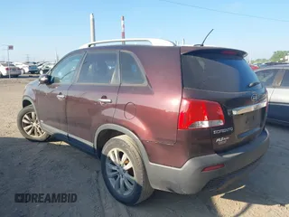 2011 Kia Sorento EX with VIN 5XYKUDA26BG059278, listed as a IAAI auction lot 42236023 with 197,740 mi miles and . Bid and sale history available at DreamBid. Image 3.