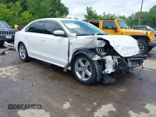 2015 Volkswagen Passat S with VIN 1VWAS7A35FC111535, listed as a IAAI auction lot 42438546 with 176,681 mi miles and . Bid and sale history available at DreamBid. Image 1.