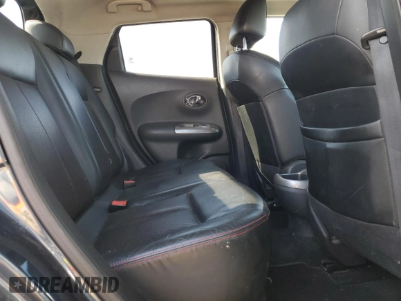2012 Nissan Juke SL z VIN JN8AF5MV2CT113672, wystawiony jako Copart lot #56562605 z przebiegiem 187 325 mil mil oraz Szkoda całkowita • Salvage title. Historia ofert i sprzedaży dostępna na DreamBid. Obrazek 11.